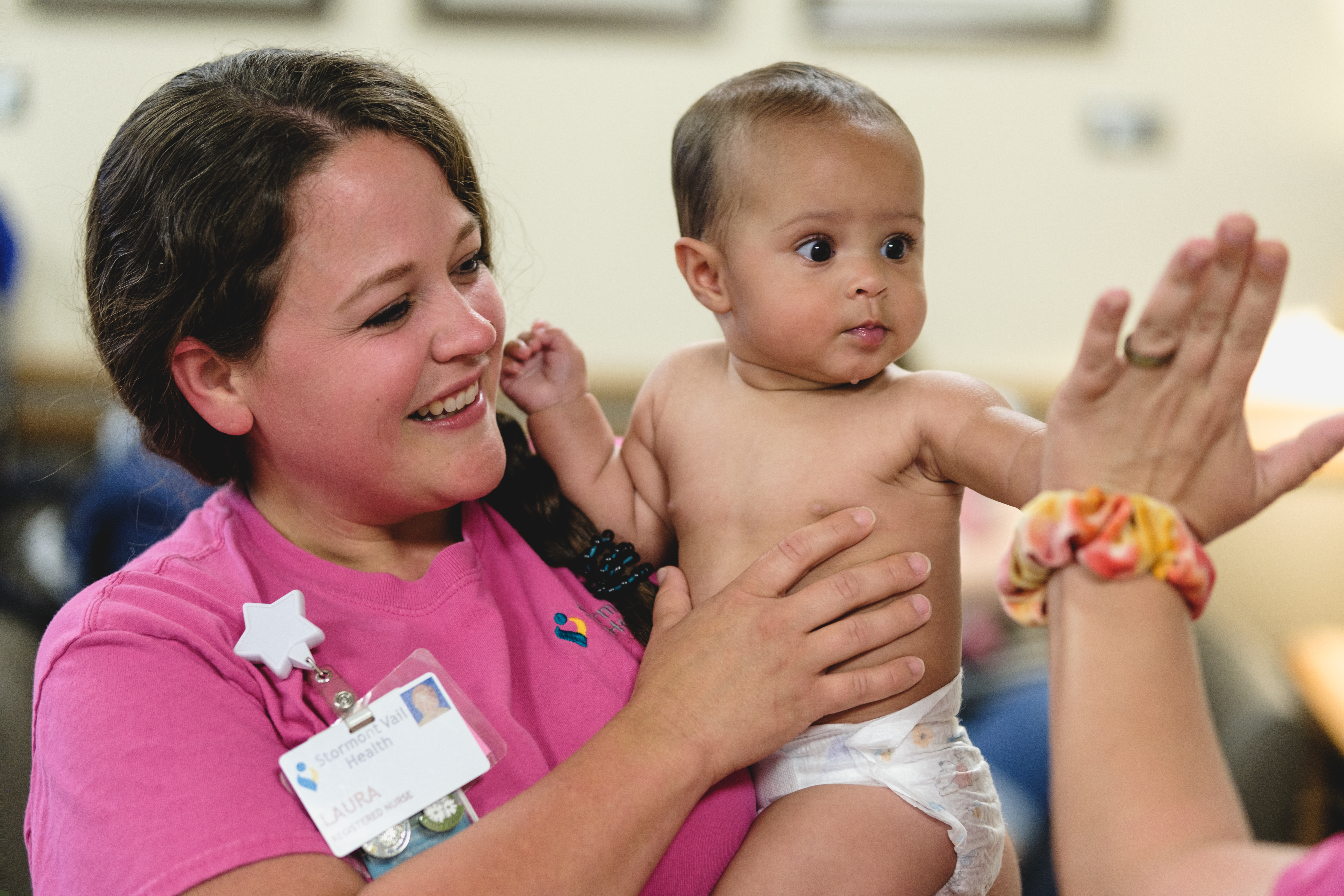 A nurse and a baby at the Stormont Vail Health breastfeeding clinic