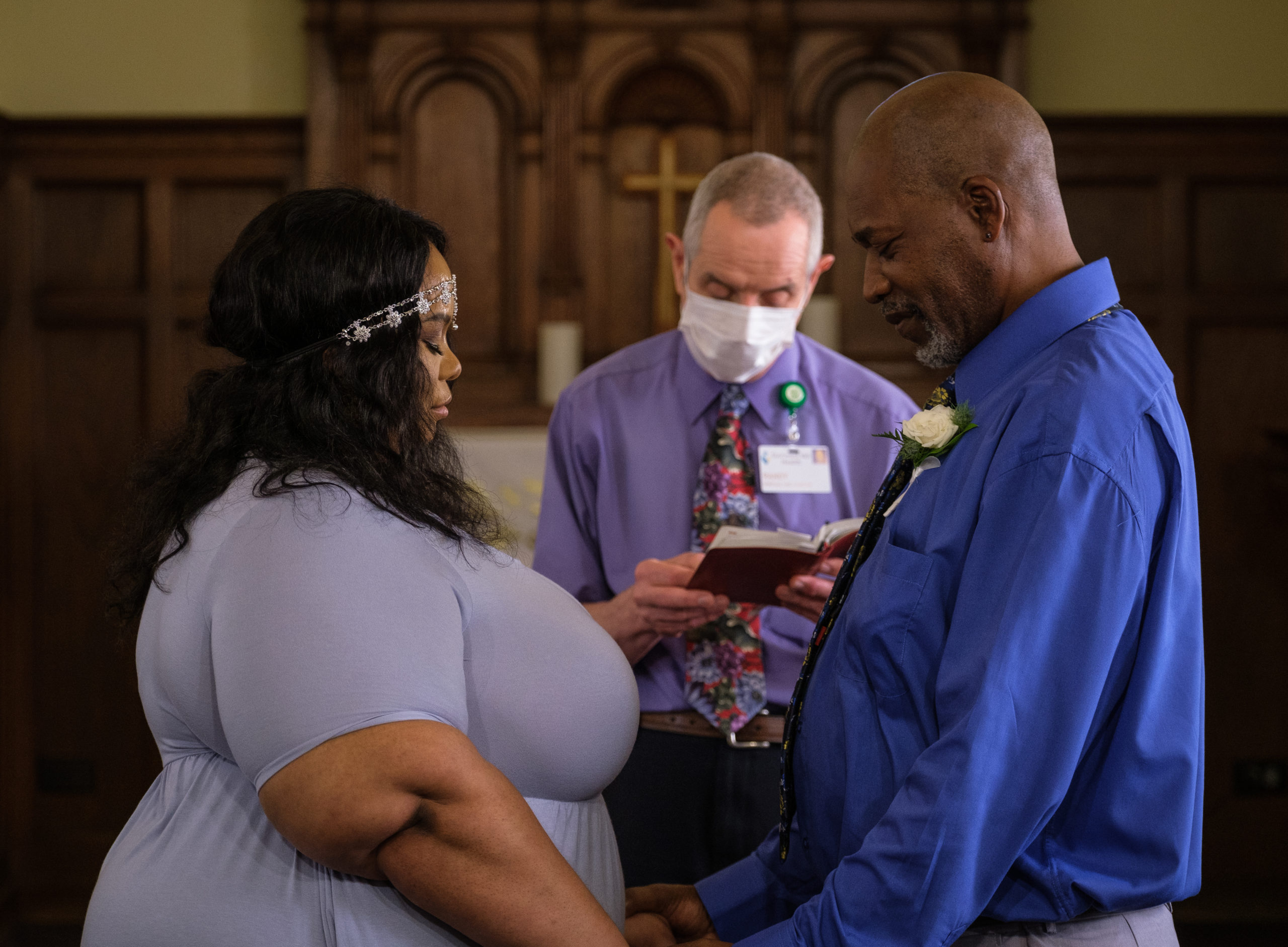 Melonie and Roderick getting married in the Stormont Vail Health chapel. 