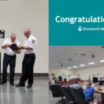 Ann Garcia-Brinker receiving award from the Shawnee Heights Fire Department.