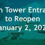 Stormont Vail Health medical facility exterior with stone signage, flags, and hospital building in background. Overlaid text announces: “South Tower Entrances to Reopen January 2, 2026.”