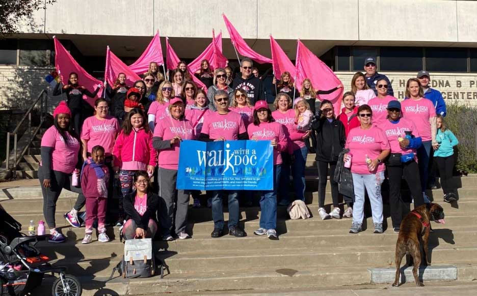Dr. Hashmi leads a Walk with a Doc talk on breast cancer awareness.