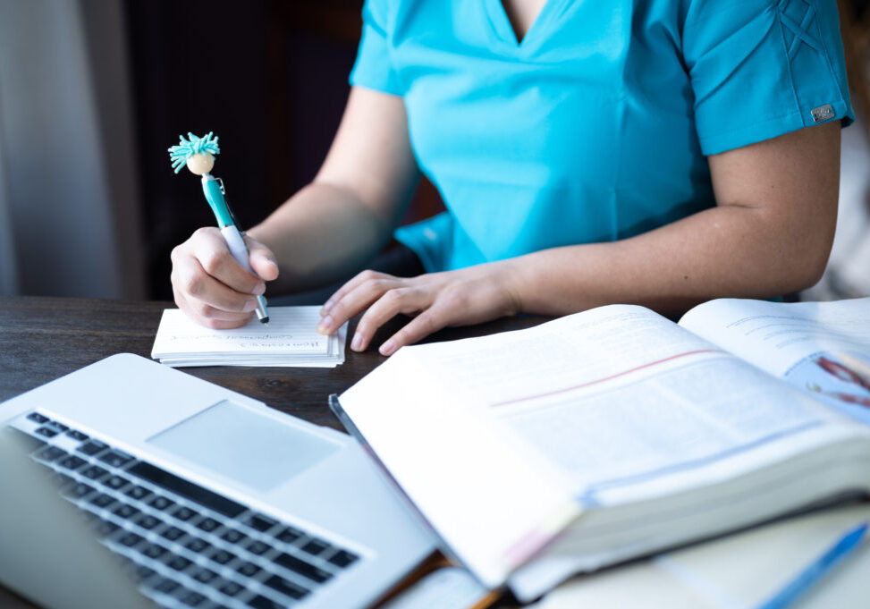 Stressed Out Nursing Student. Studying For An Exam.