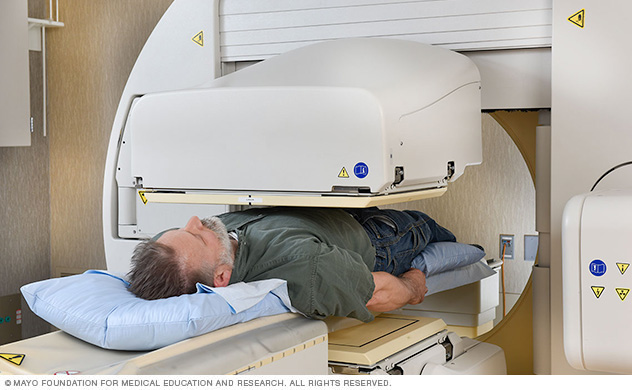 A person undergoing a SPECT scan